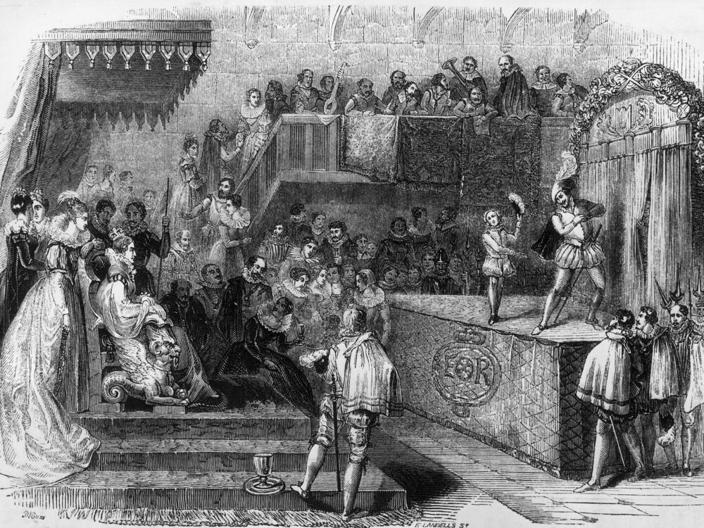 1563, A play being performed before the court of Queen Elizabeth I of England.