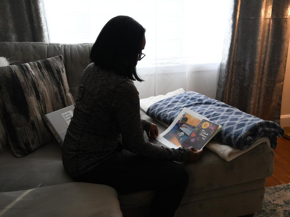 The mother of a 17-year-old boy detained in the Prince George's County Detention Center bought greeting cards for her son but couldn't bring herself to mail them. Beneath the cards is a photo of her son in a science lab at his high school.