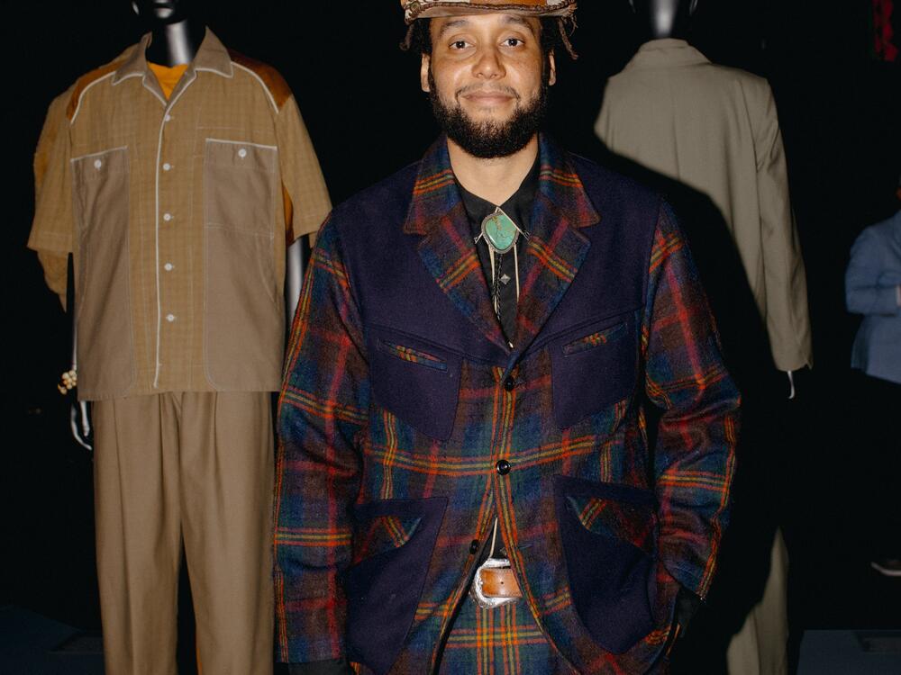 Nicholas Daley stands in front of his pieces during a press preview for the Met's 