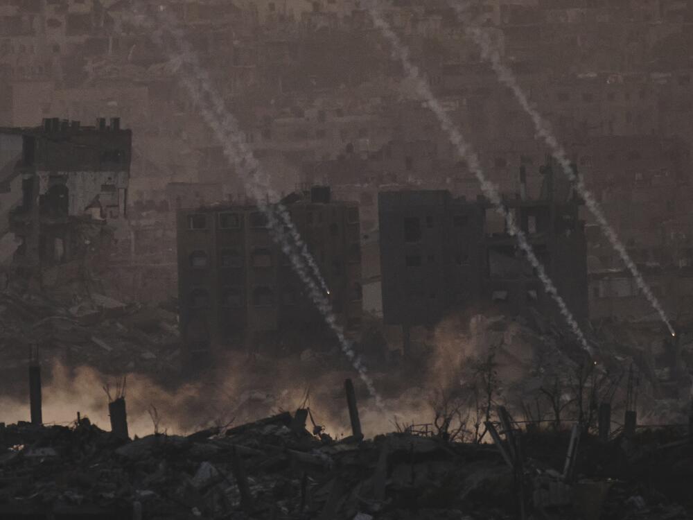 Israeli shelling hits an area in the northern of Gaza Strip as seen from southern Israel, Tuesday.