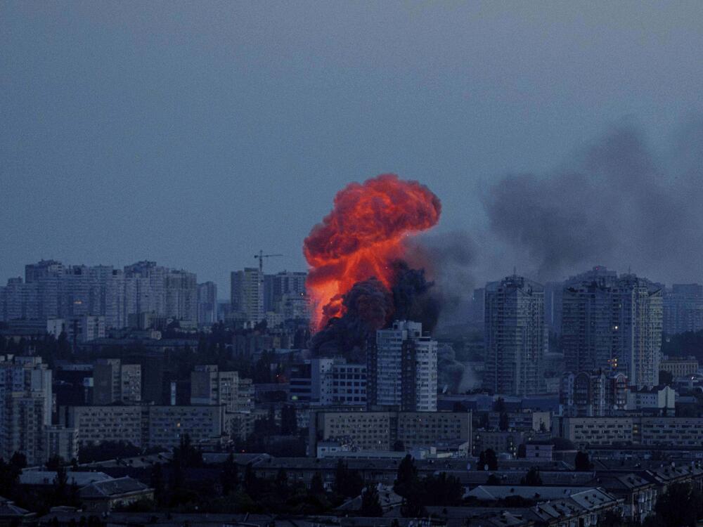 Explosion is seen after Russian air strike on Kyiv, Ukraine, on Friday.