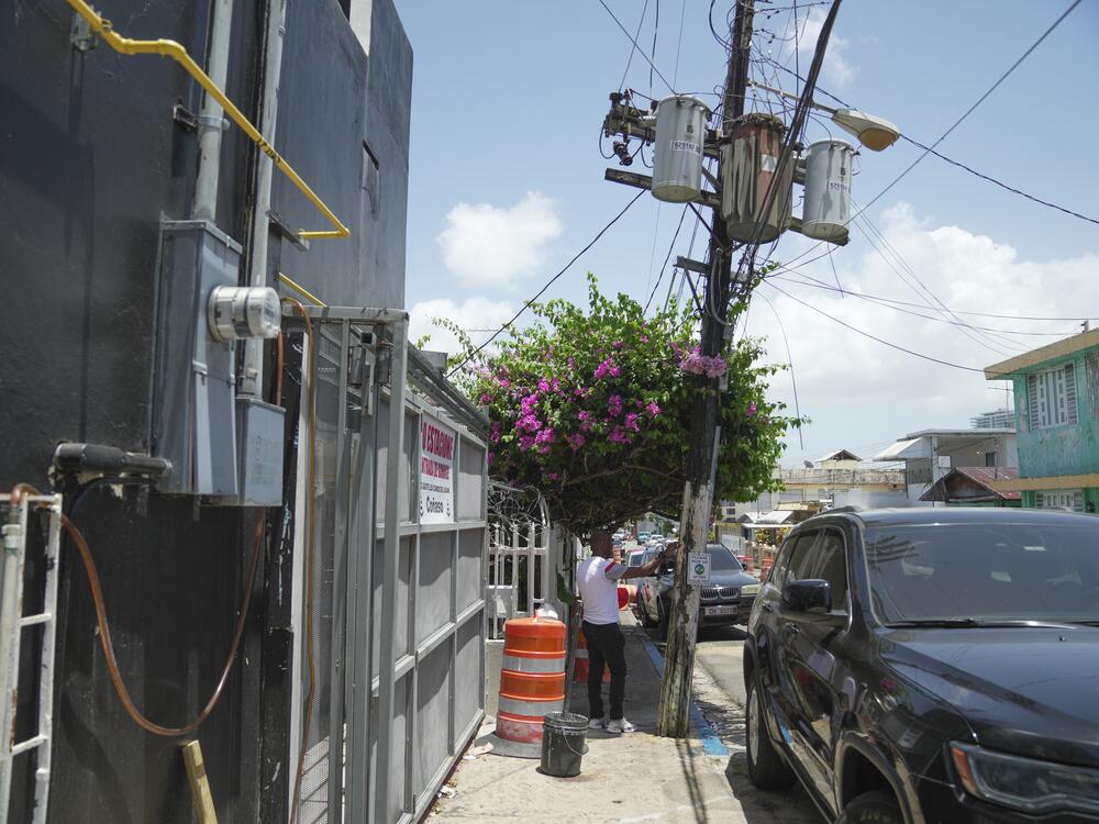 Juan Vega Paredes walks by the exact place where he was detained by immigration authorities in January. He was on his way to buy some avocados when he was arrested.