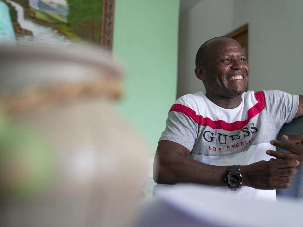 Juan Vega Paredes, a Dominican man who was arrested by immigration authorities in Puerto Rico in January, poses for a portrait in his home in San Juan, Puerto Rico on June 3, 2025.