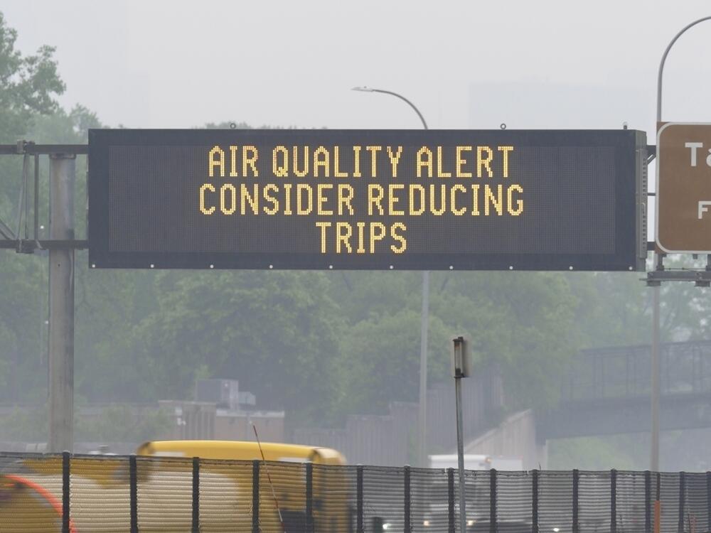 A sign warns of an air quality alert as smoke from wildfires burning in Canada reaches Minneapolis on Tuesday.