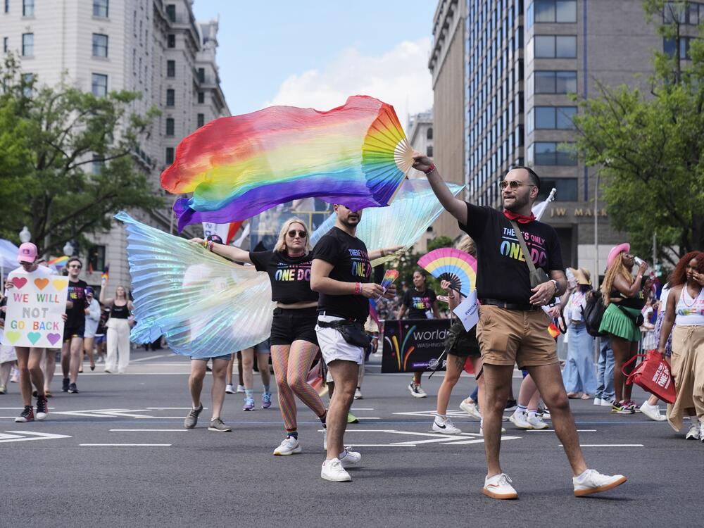Participants march during the World Pride parade, Saturday, in Washington.