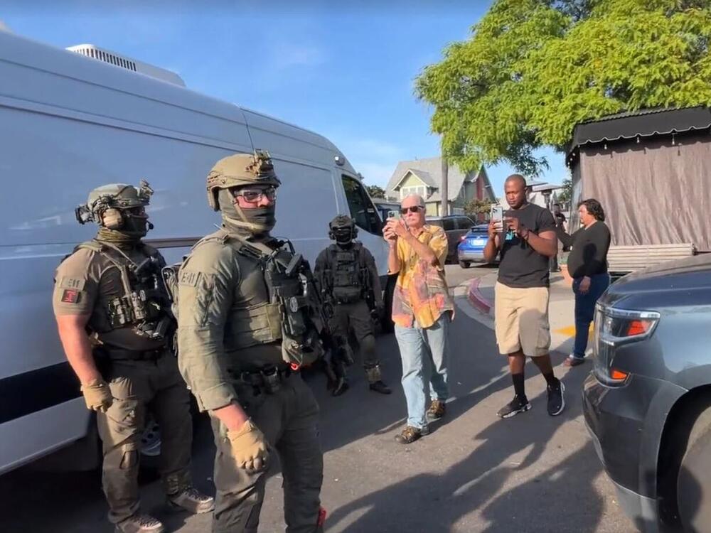 U.S. Immigration and Customs Enforcement agents execute a criminal search warrant on May 30, 2025, at Buona Forchetta in San Diego, Calif.