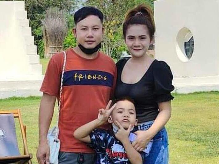 This undated photo provided by the Hostage's Family Forum shows Nattapong Pinta, with his wife and son.