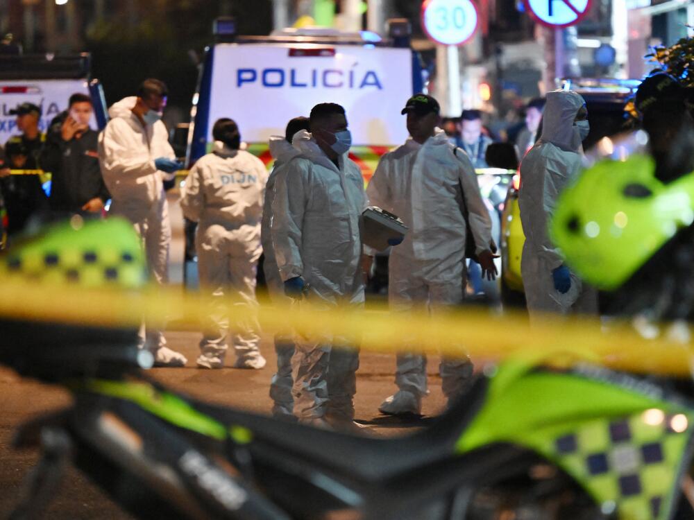Forensic experts work at the crime scene where Senator Miguel Uribe Turbay was shot and wounded in the Modelia neighborhood in Bogota on June 7, 2025.