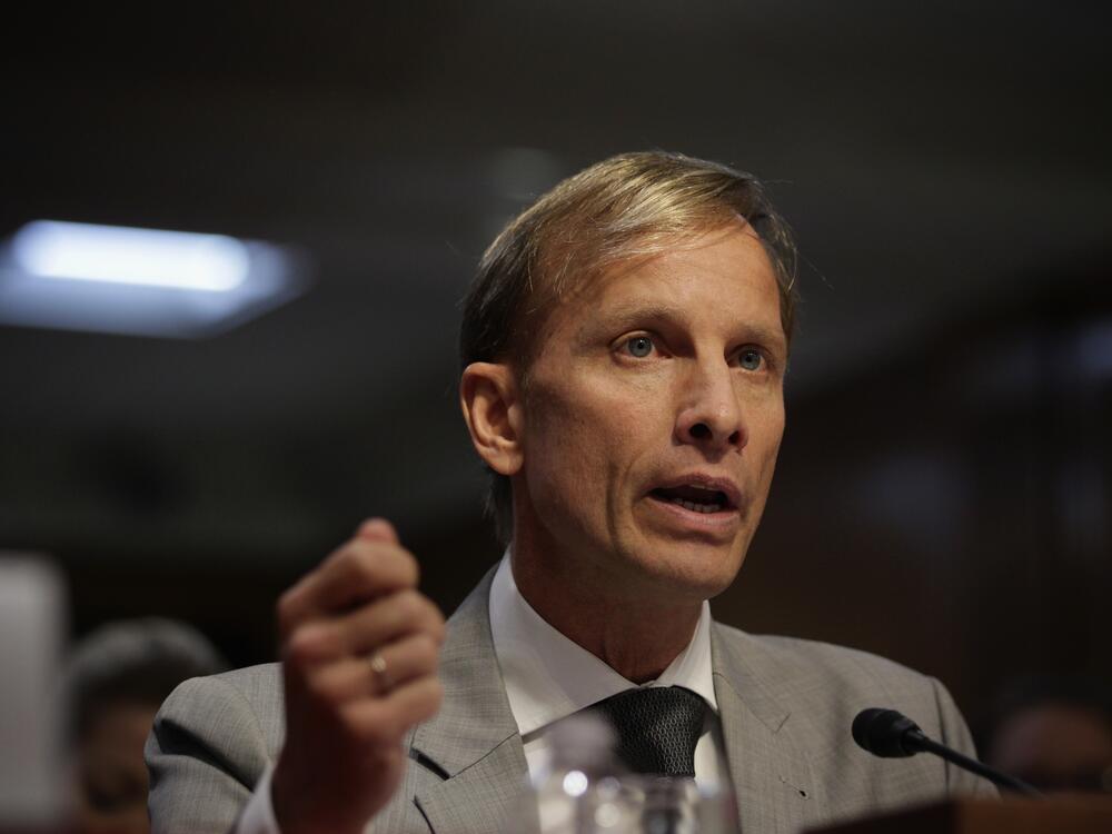 Dr. Mark Dybul addresses a Senate hearing on global health issues in 2015. He was an architect of PEPFAR, the program created by President George W. Bush to stop the spread of AIDS. Programs like PEPFAR have saved lives, built health systems and brought more stability to countries hard hit by the virus, he says.