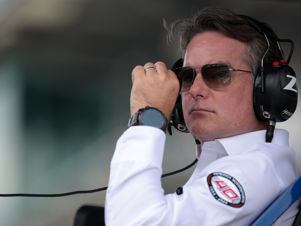 Jeff Gordon, Vice Chairman of Hendrick Motorsports looks on from the pit box during the NASCAR Cup Series Brickyard 400 at Indianapolis Motor Speedway on July 21, 2024 in Indianapolis, Indiana. (Photo by James Gilbert/Getty Images)