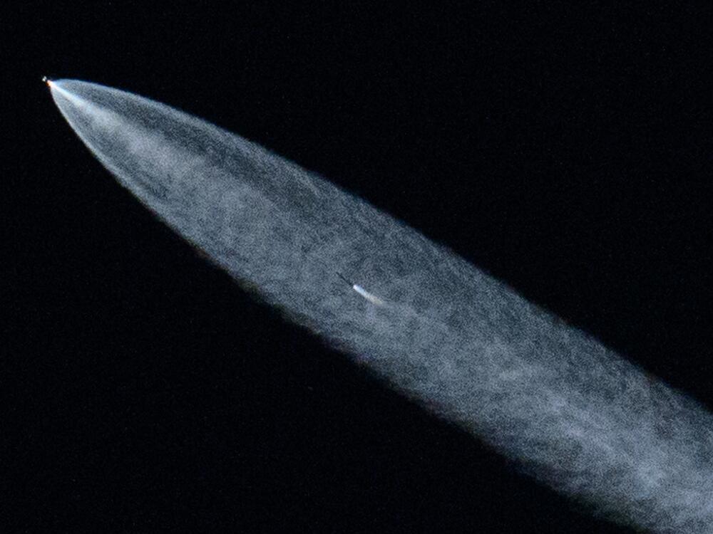 A SpaceX Falcon 9 rocket with a payload of 20 Starlink satellites is seen in the evening sky above Lawndale, Calif., after being launched from Vandenberg Space Force Base on June 18, 2024.