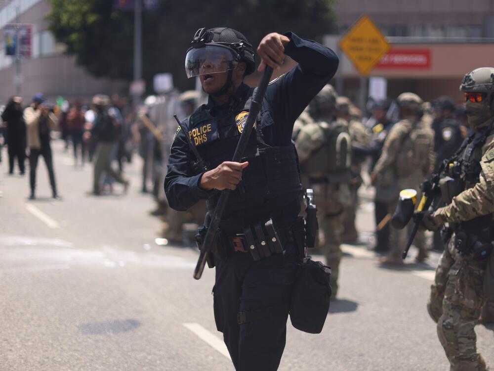 Immigration and Customs Enforcement (ICE) and Department of Homeland Security (DHS) agents take security measures as protests and confrontations between immigration rights supporters and law enforcement continue.