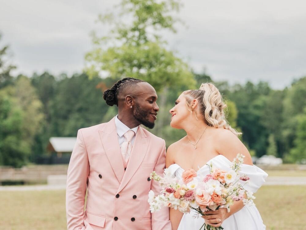 Alia and Donovan Campbell lovingly looking at each other on their wedding day of May 17, 2024, in Charleston, S.C.