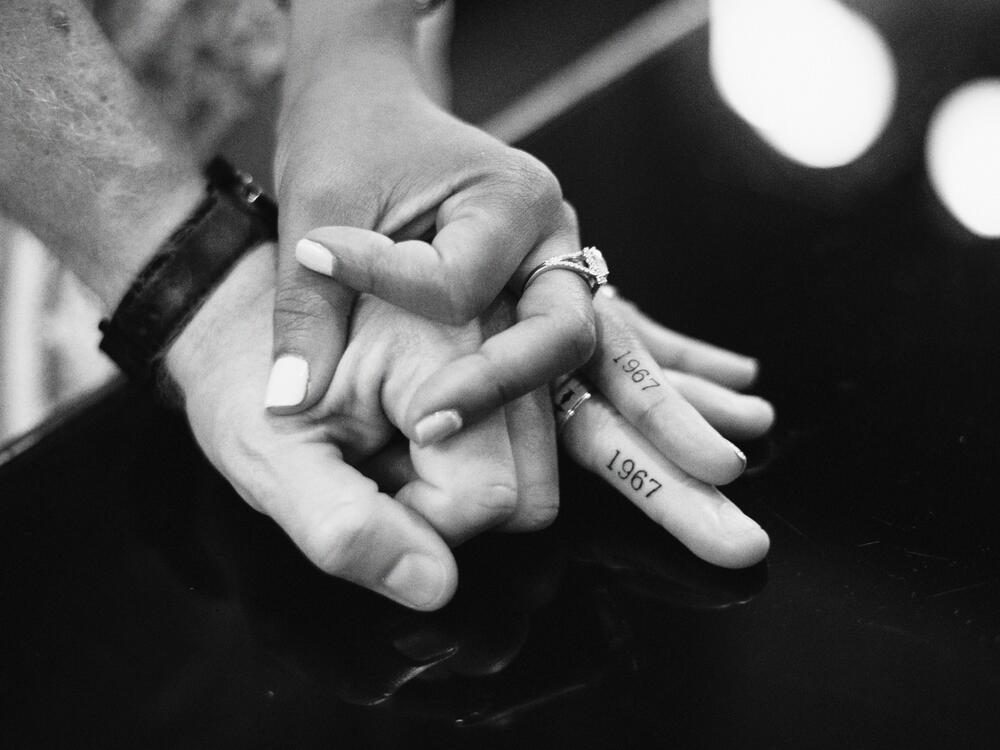 Valin Jordan and her husband show off their matching 1967 tattoos.