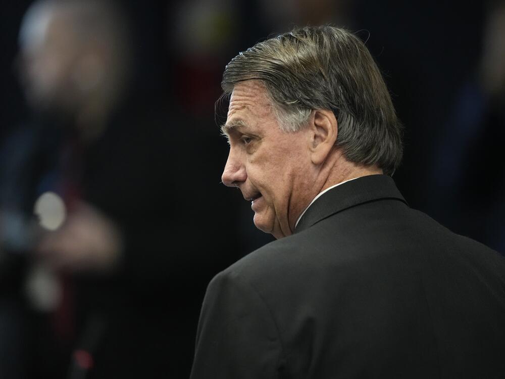 Former Brazilian President Jair Bolsonaro attends his Supreme Court trial along with others charged in an alleged coup plot to keep him in office after his 2022 election defeat, in Brasilia, Brazil, Tuesday, June 10, 2025.