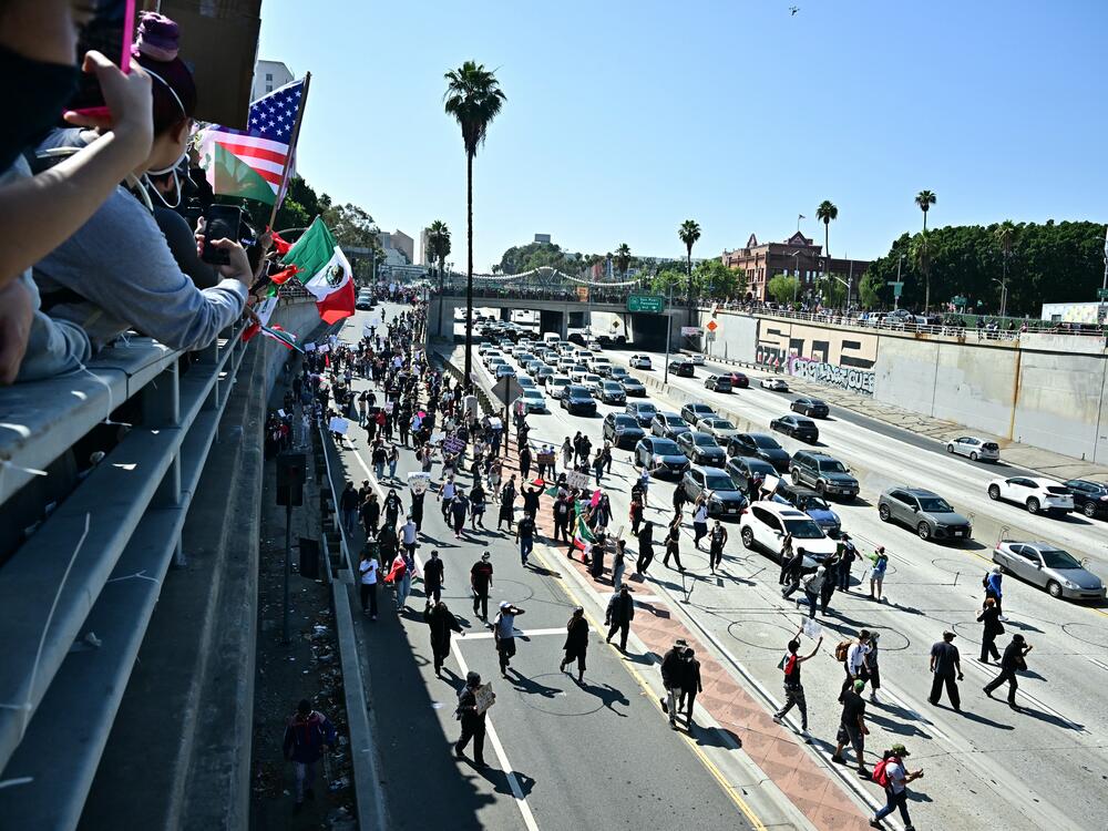 Demonstrators block a highway in Los Angeles on Sunday.