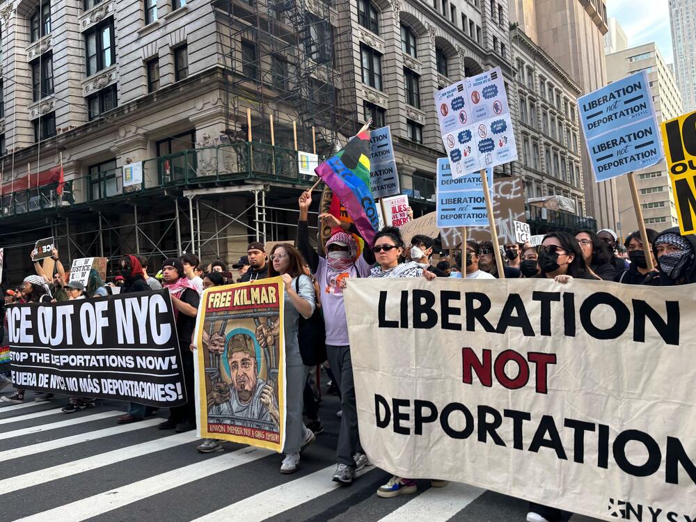 Thousands of people marched throughout the streets of Manhattan Tuesday night as part of a series of nationwide rallies against President Trump's immigration sweeps and the deployment of the U.S. military in California.