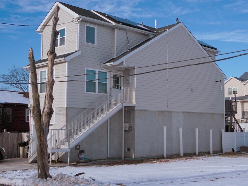 Some homes in Staten Island were raised as high as 18 feet after Superstorm Sandy while homes next door were demolished and turned into empty lots. Others haven't changed at all. Neighbors call this the 