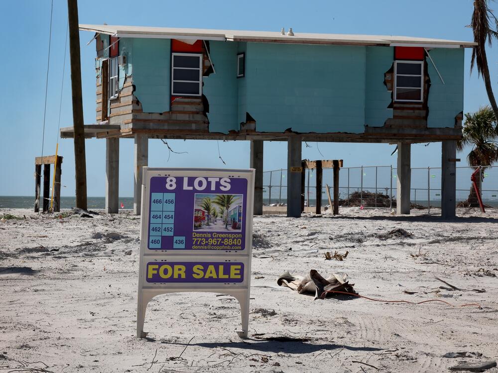 Lots were for sale in Fort Myers Beach, Florida, in January 2023 after homes there were destroyed by Hurricane Ian in 2022.