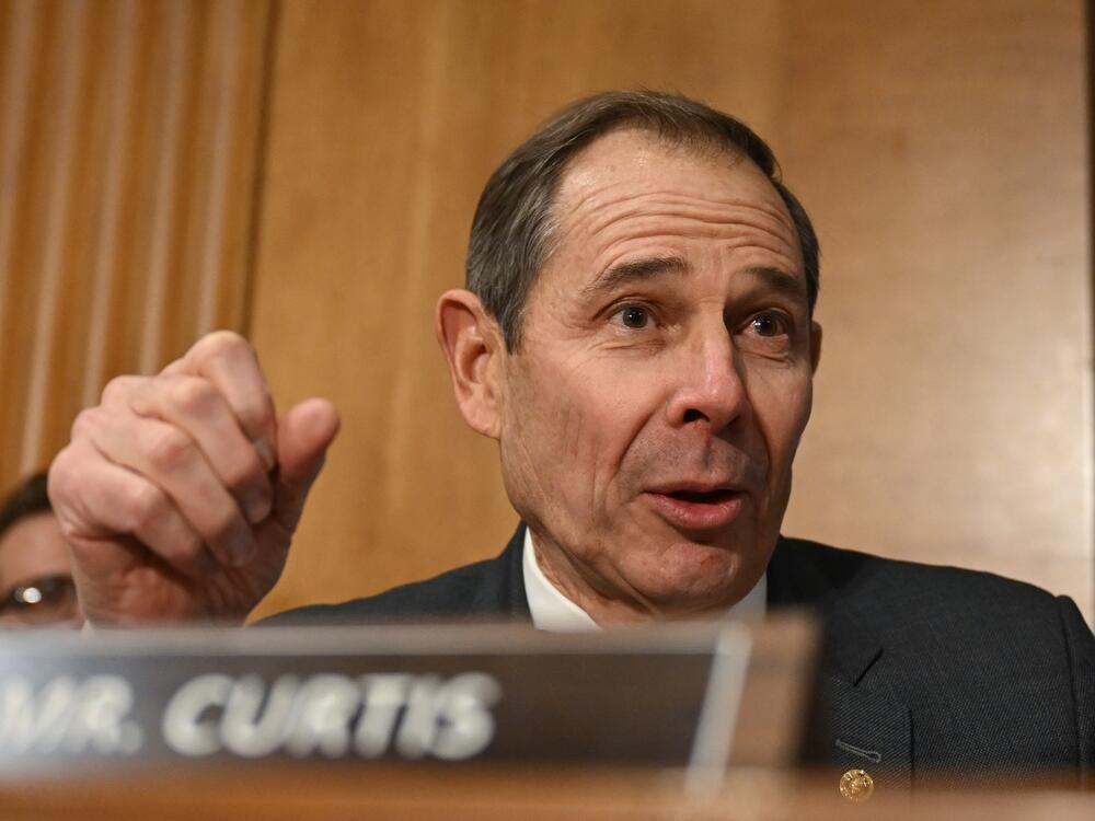 Republican Sen. John Curtis of Utah, seen here on Capitol Hill in January,  wants to see a careful evaluation of the merit of each tax credit and thoughtful phase-outs. (Photo by ANDREW CABALLERO-REYNOLDS / AFP) (Photo by ANDREW CABALLERO-REYNOLDS/AFP via Getty Images)
