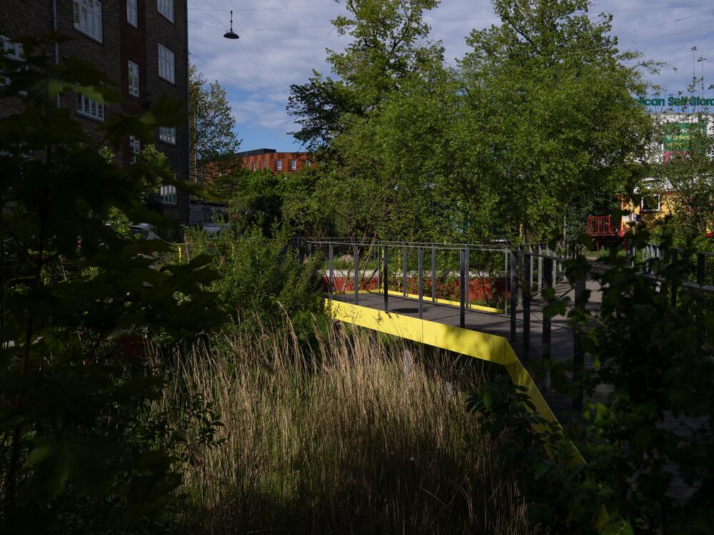 Evidence of Copenhagen's plan to fight flooding can be seen all over the city — like this catchment basin in a green space along Scandiagade street.
