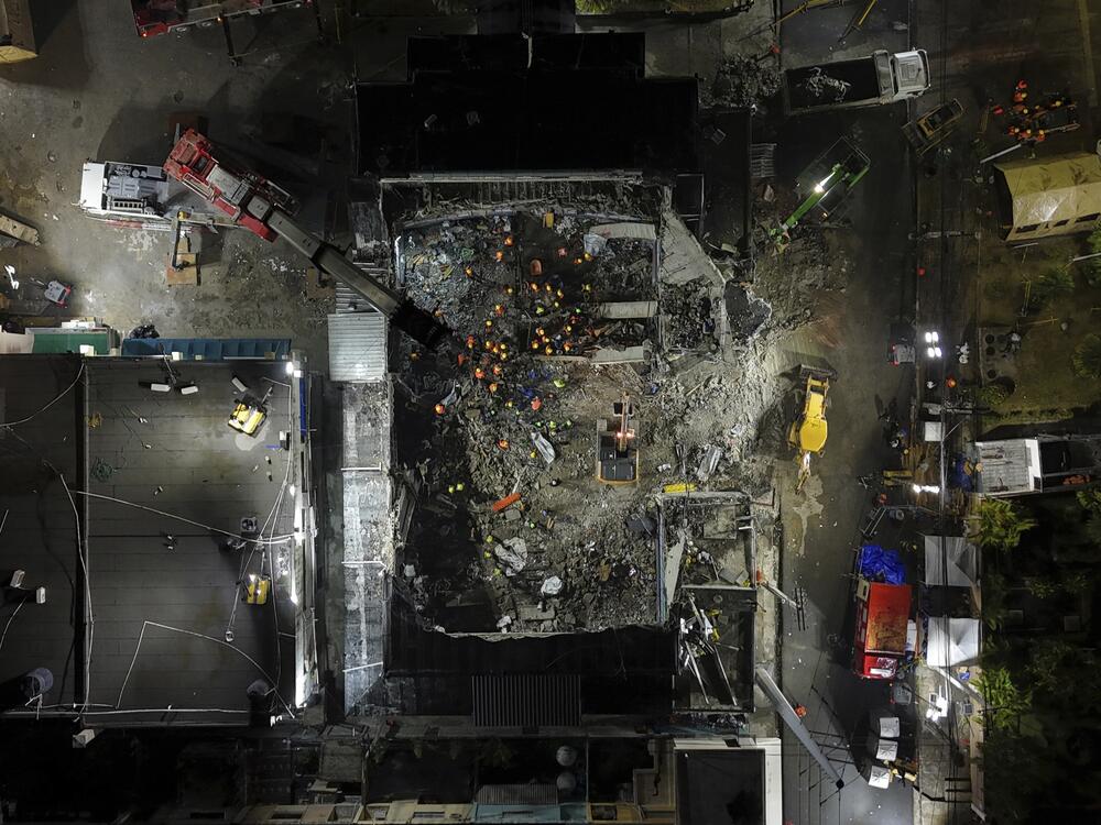 Rescue workers search for bodies at the Jet Set nightclub after its roof collapsed during a merengue concert in Santo Domingo, Dominican Republic in April.