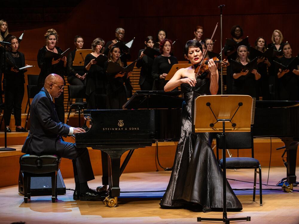 Billy Childs, left at the piano, wrote his first requiem, <em>In the Arms of the Beloved</em>, for violinist Anne Akiko Meyers, right, performed here with the Lyris Quartet and the Los Angeles Master Chorale.