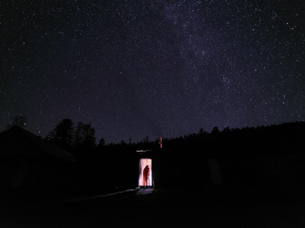 In eastern Siberia, Hao-Cheng Yu, a geologist, returns to his cabin after studying mineral deposits in the area.