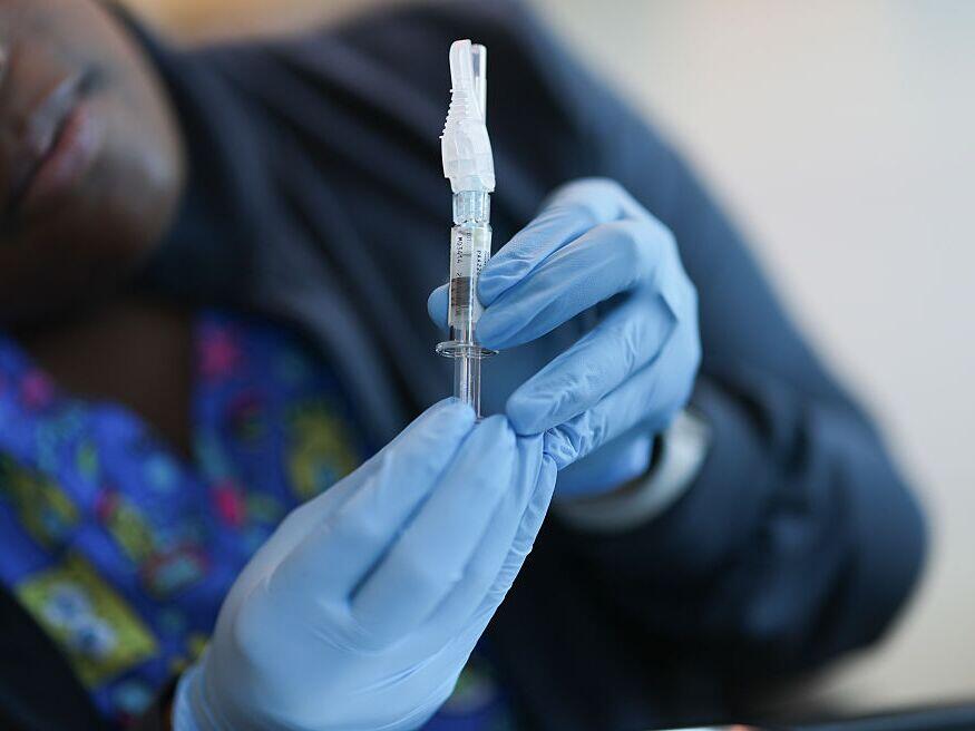 A group of medical experts that advise the CDC largely determine which vaccines people should receive, what gets covered by insurance and which shots are made available free of charge to millions of low-income children.