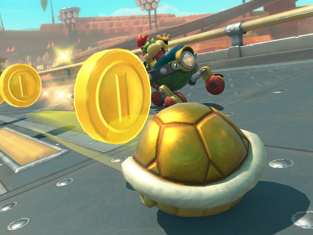 Mario Kart World's golden shell disperses coins to all who follow it.