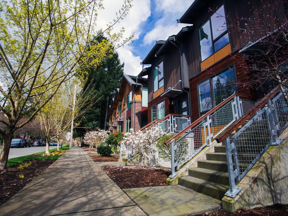 The Bryant Heights development is a modern mix of apartments, town houses, single-family homes and retail. Architects Ray and Mary Johnston worked with the developer to place 86 housing units where there were initially four.