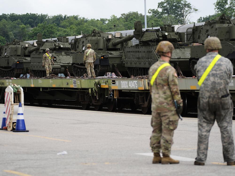 U.S. Army personnel offload tanks and other military vehicles, Monday, June 9, 2025, at the CSX railroad yard in Jessup, Md., ahead of an upcoming military parade commemorating the U.S. Army's 250th anniversary and coinciding with President Donald Trump's 79th birthday.