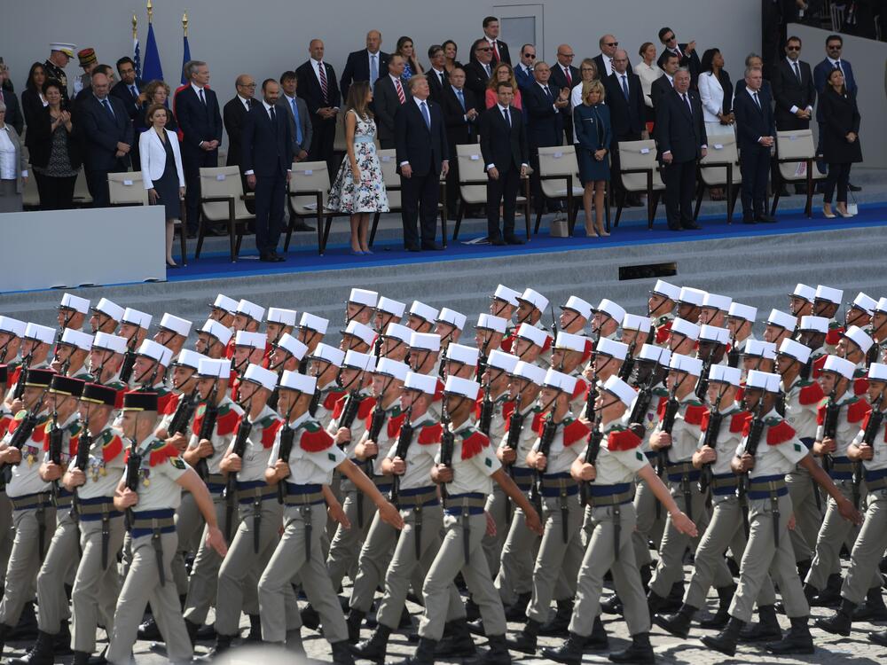 (FromL) French Defence Minister Florence Parly, French Prime Minister Edouard Philippe, US President Donald Trump and his wife First Lady Melania Trump, French President Emmanuel Macron and his wife Brigitte Macron, Senate President Gerard Larcher, the President of the French National Assembly Francois de Rugy and the Mayor of Paris Anne Hidalgo watch the Bastille Day military parade on July 14, 2017.