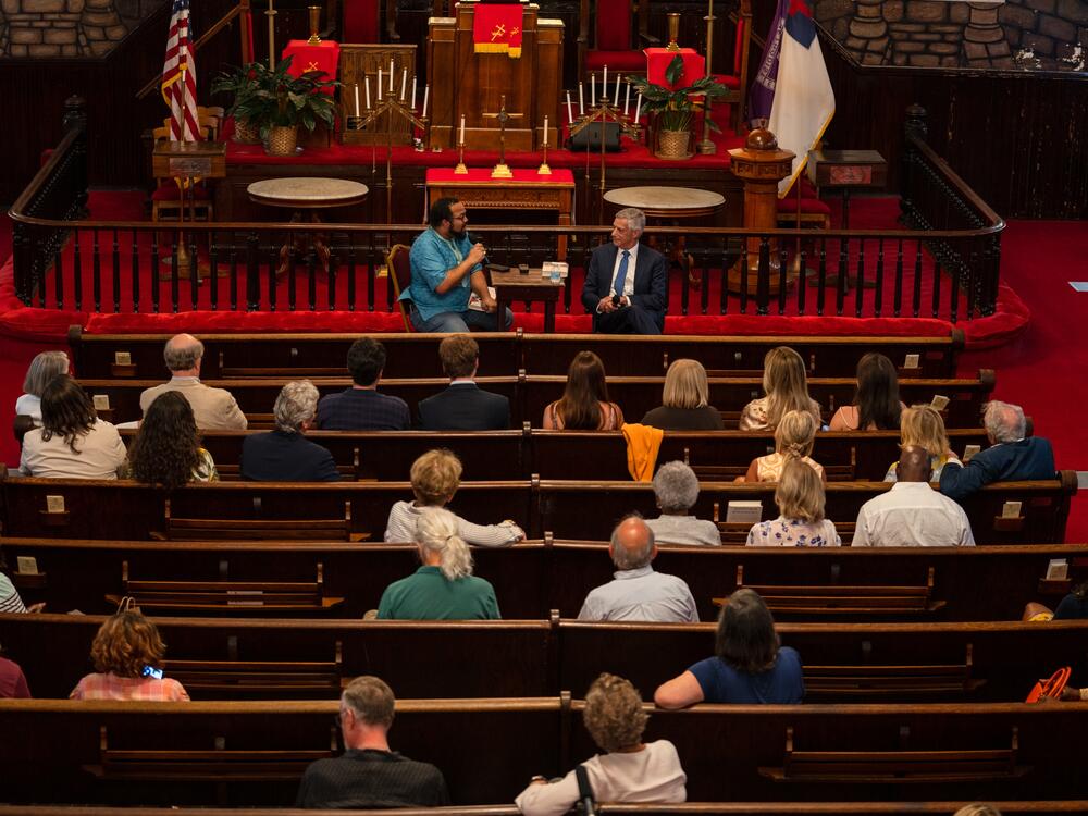 Author Kevin Sack (R) is interviewed at a book release event at Emanuel AME Church in Charleston, SC on June 2, 2025.