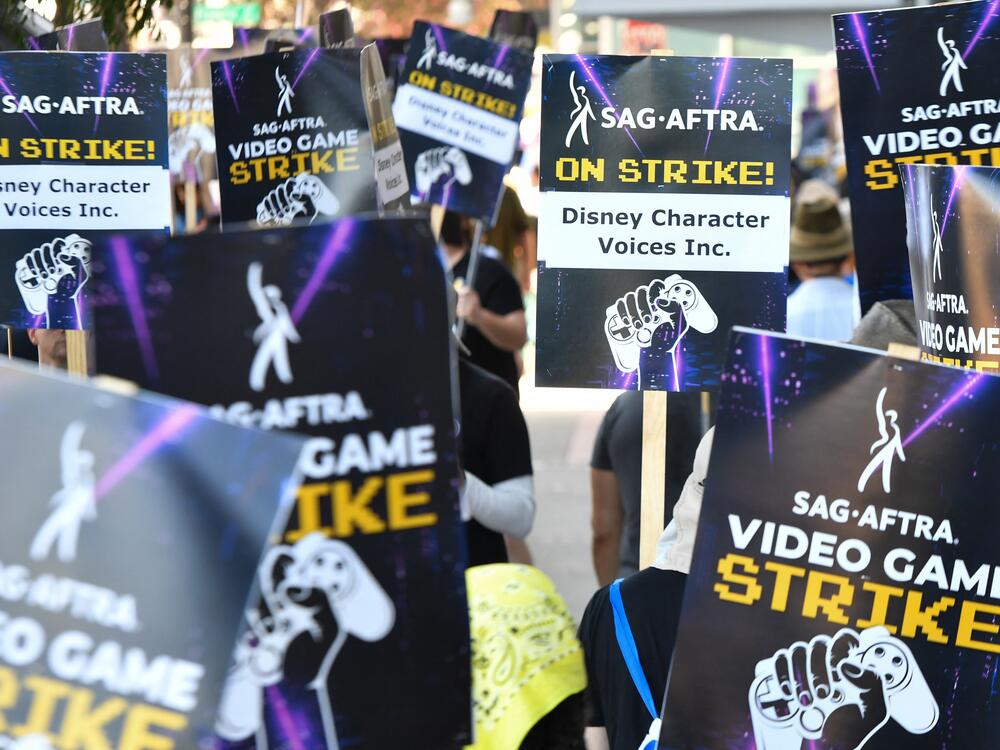 Striking performers picket outside Disney Character Voices, a subsidiary of The Walt Disney Company, in Burbank, California, in August.