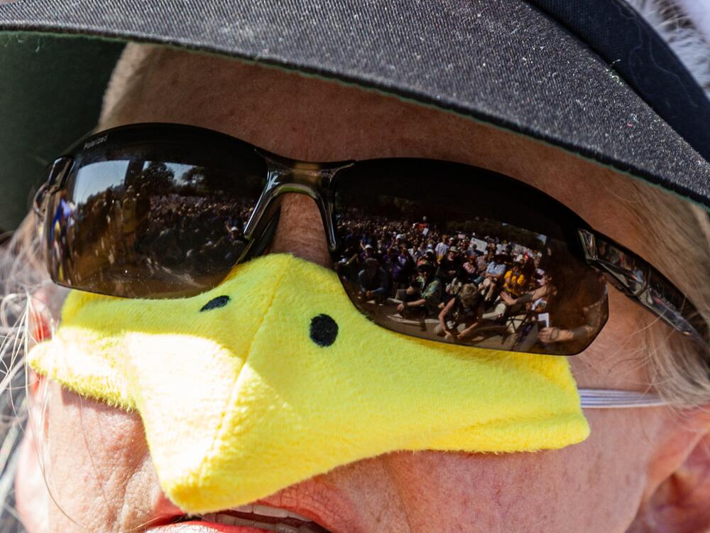 Austin: A woman wears a duck beak during the No Kings protest at the Texas Capitol.