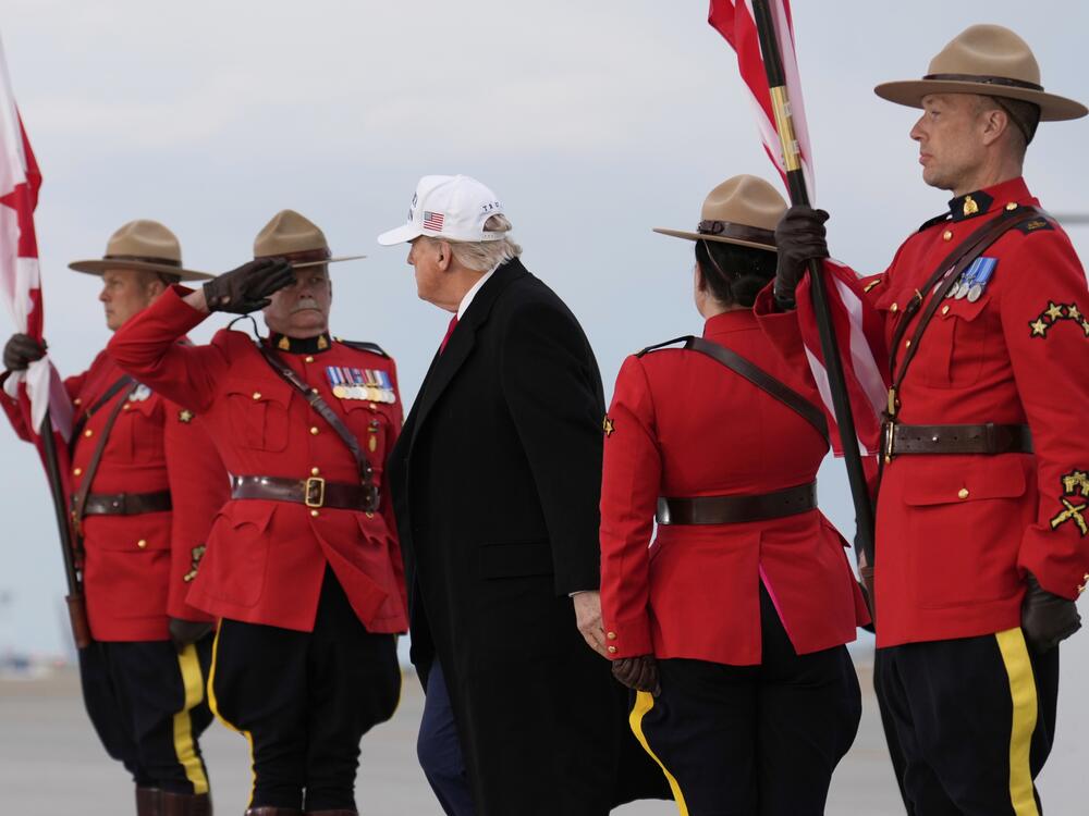 President Donald Trump arrives on Air Force One at Calgary International Airport on Sunday.