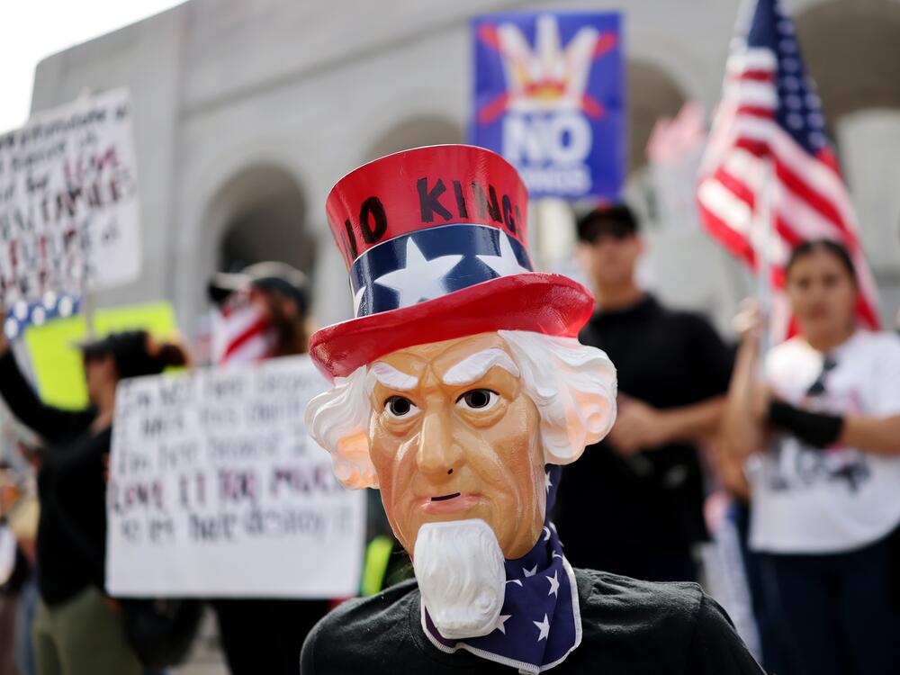 Protesters rally in front of City Hall in Los Angeles on Saturday.