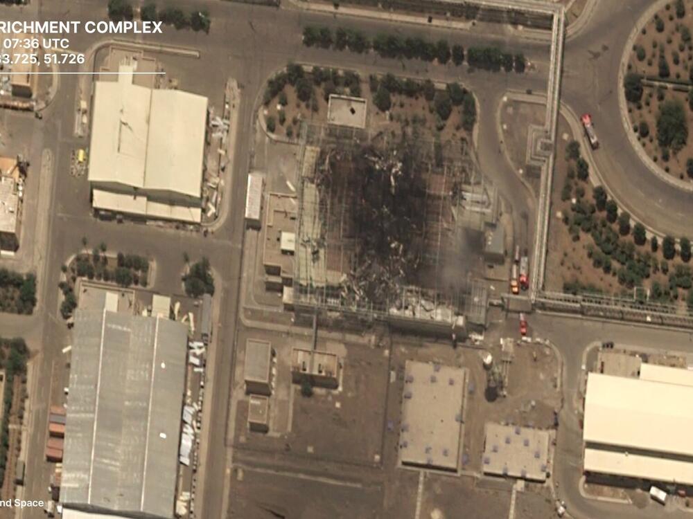 A satellite photo from the European firm Airbus shows the aftermath of a strike by Israel on a building that houses centrifuges at Iran's Natanz nuclear facility.