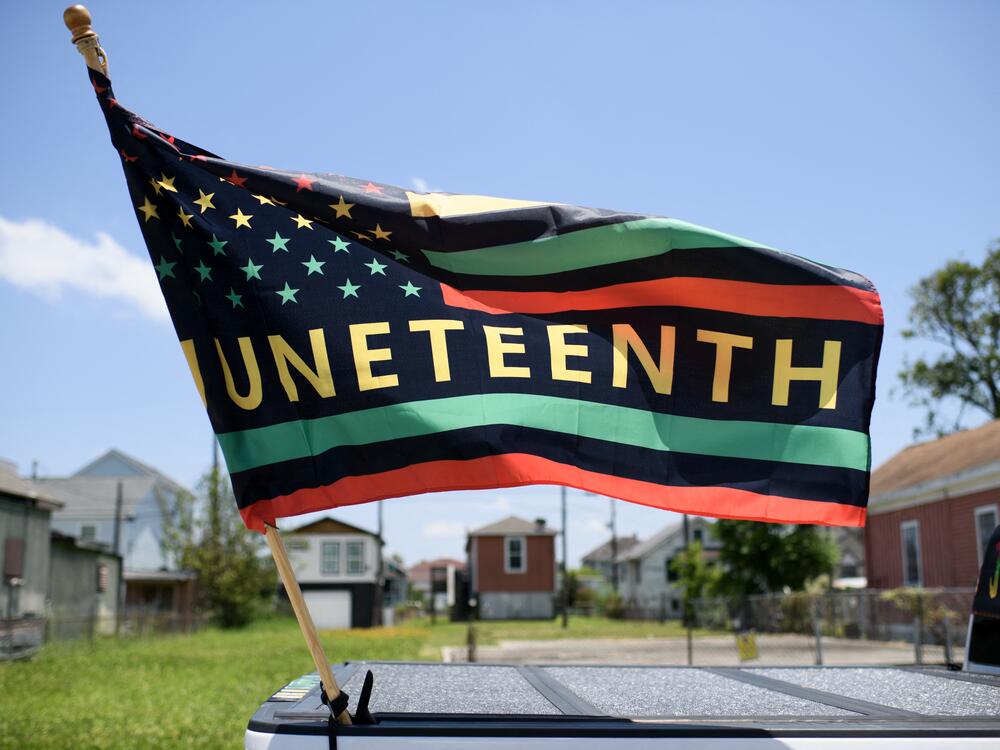 A Juneteenth flag flies on a float during the 45th annual Juneteenth National Independence Day celebrations in Galveston, Texas in 2024.