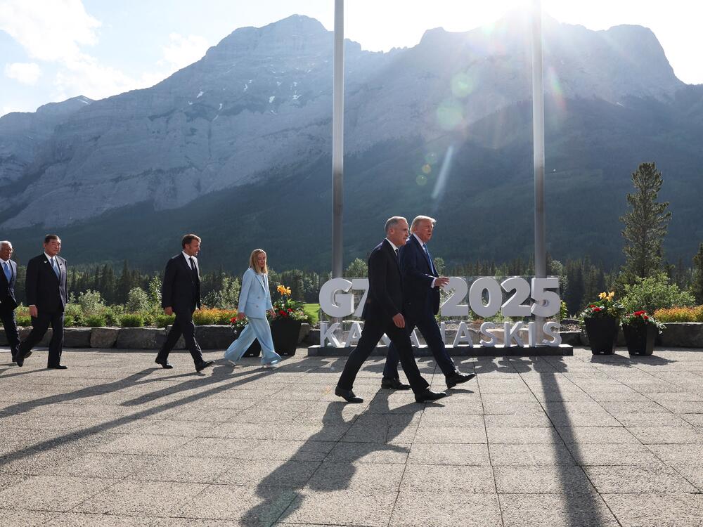 President Trump, Canadian Prime Minister Mark Carney and other G7 leaders depart after a family photo for the summit in Kananaskis, Alberta, Canada, on June 16.