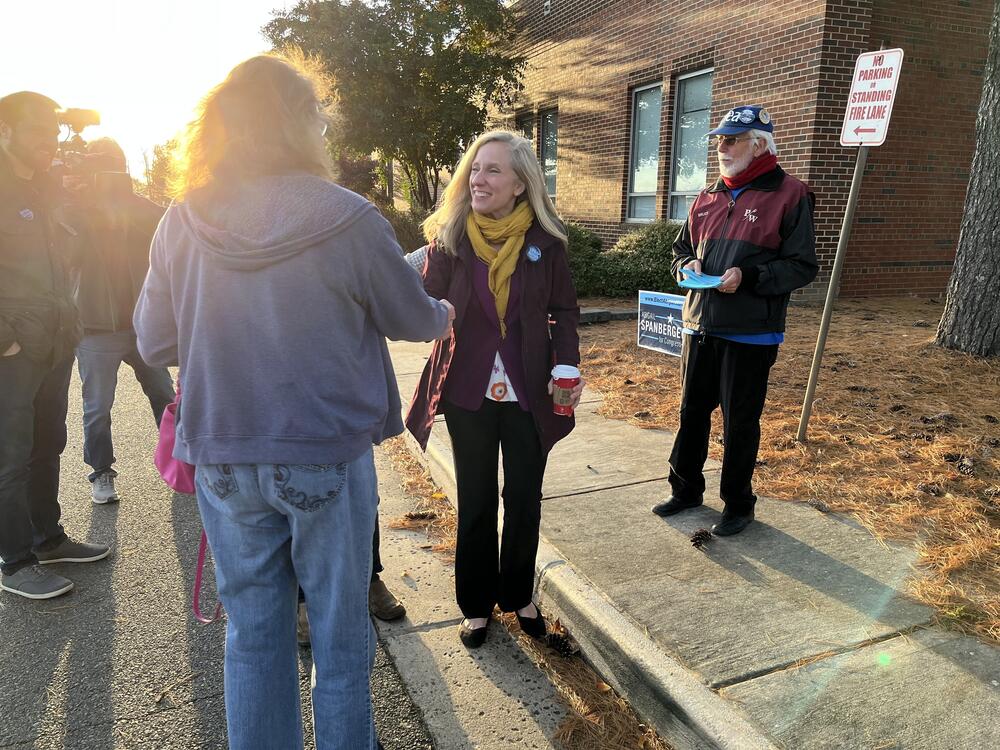 Rep. Abigail Spanberger greets voters on Election Day 2022 in Prince William County, Virginia.