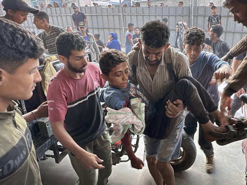 Palestinians are brought to Nasser hospital in Khan Younis after being wounded or killed by Israeli forces while they tried to get food on Tuesday.