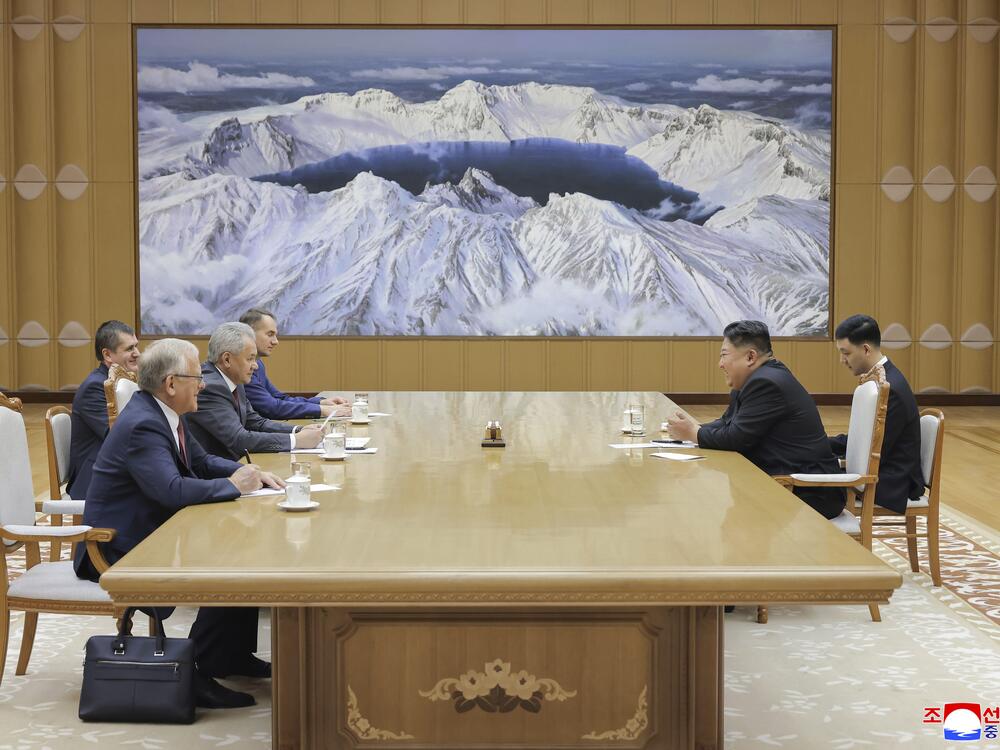 In this photo provided by the North Korean government, Russian Security Council Secretary Sergei Shoigu, third left, meets with North Korean leader Kim Jong Un, second right, at the headquarters of the ruling Workers' Party in Pyongyang, North Korea, Tuesday, June 17, 2025. Independent journalists were not given access to cover the event depicted in this image distributed by the North Korean government. The content of this image is as provided and cannot be independently verified. Korean language watermark…