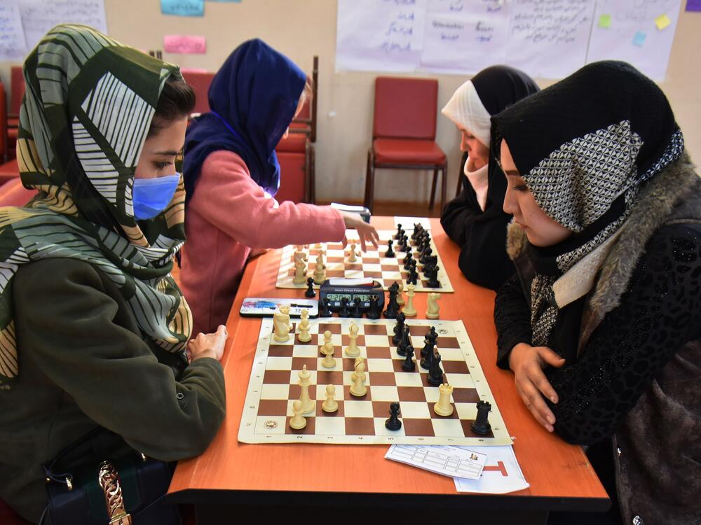 Girls play in a 2021 chess competition in Mazar-e-Sharif, capital of the northern Balkh province, Afghanistan. Girls and women had been encouraged to learn the game — until the Taliban took power and ordered a suspension of women playing chess outside their homes — a precursor to the 2025 ban on the game.