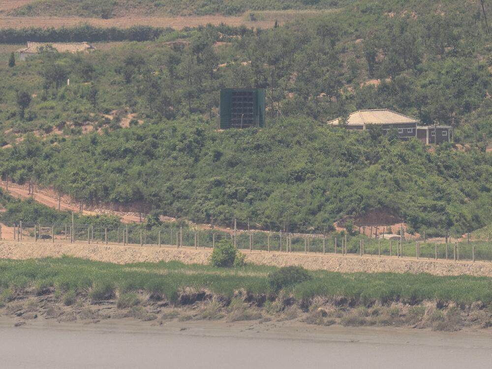 This photo shows a general view of a North Korean giant loudspeaker (C), near the Demilitarized Zone (DMZ) dividing the two Koreas, in Paju on June 12, 2025.