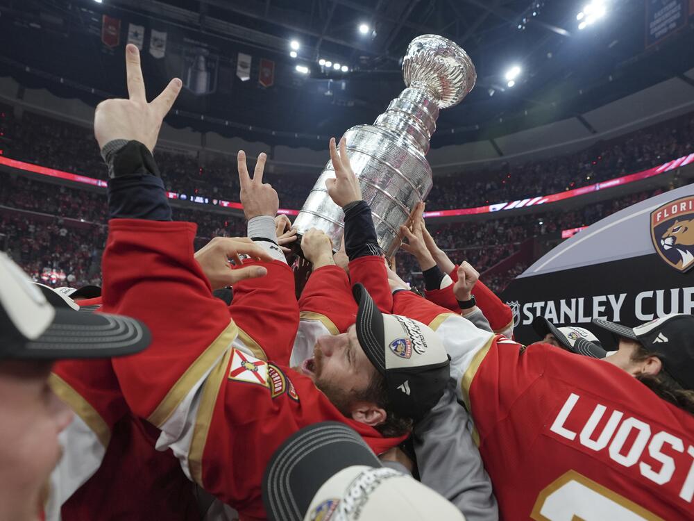 Florida Panthers left wing Matthew Tkachuk helps raise the Stanley Cup trophy after defeating the Edmonton Oilers in Game 6 of the NHL hockey Stanley Cup Final on Tuesday.