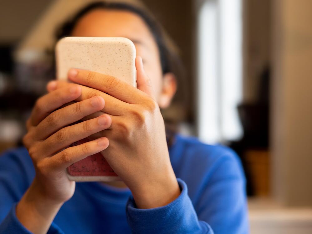 The study asked about signs of addiction to mobile phones, social media and video games. Those signs can include being preoccupied thinking about them and being unable to cut down on using them.