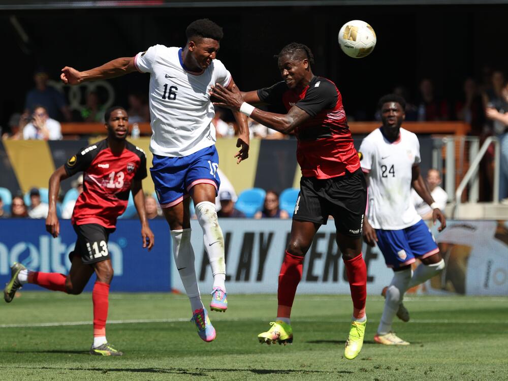 Alexander Freeman #16 of the United States battles Sheldon Bateau #4 of Trinidad and Tobago during the Gold Cup 2025 on Sunday in San Jose, Calif. The U.S. defeated Trinidad and Tobago to snap a four-game losing streak as it eyes next year's World Cup, which the U.S. is co-hosting.