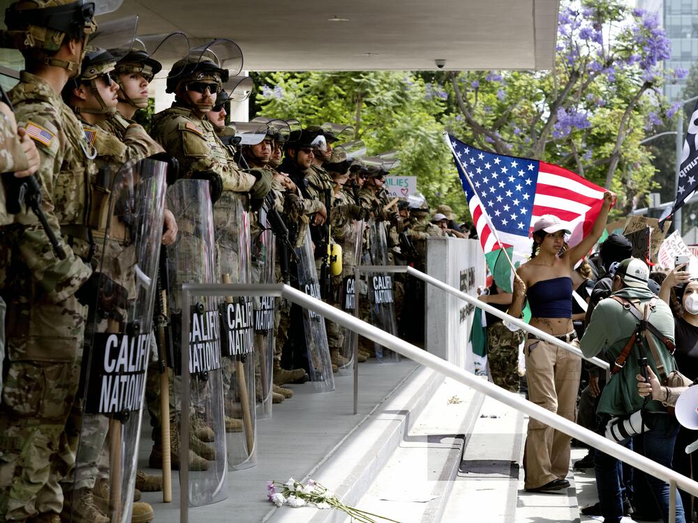 Protesters stand off against California National Guard soldiers at the Federal Building in downtown Los Angeles during a 